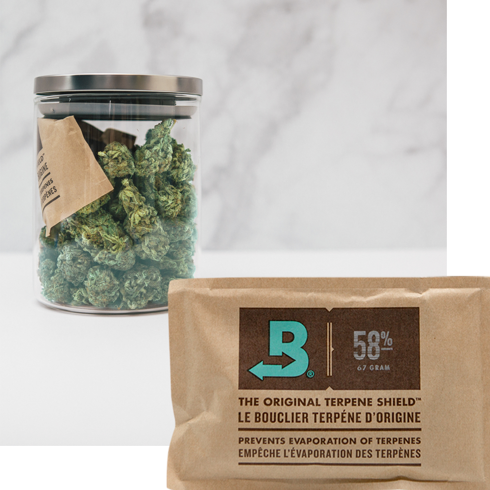 Boveda size 67 and a jar of flower protected by Boveda.