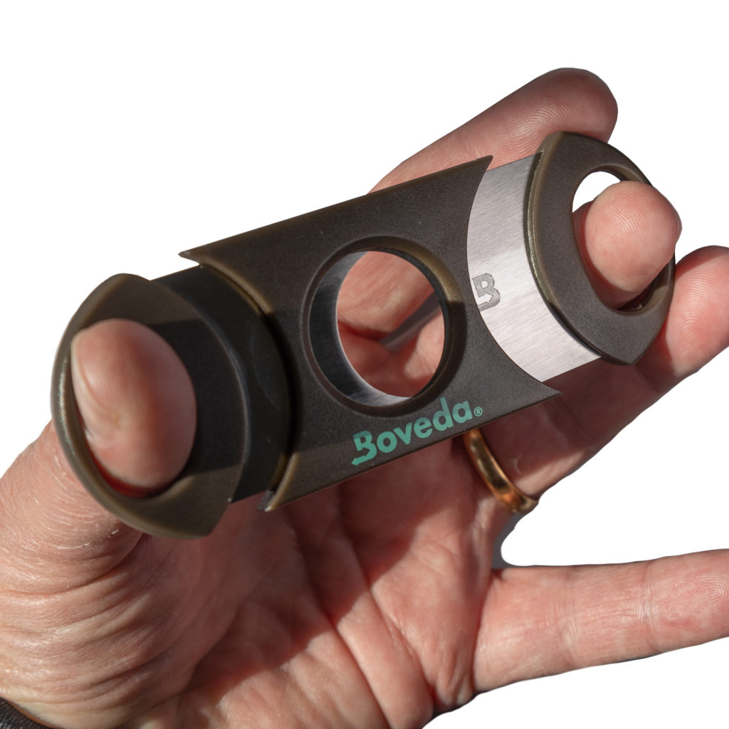 Using a double guillotine like this Boveda cigar cutter gives a straight cut on cigars.