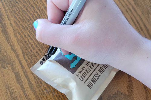 Write date on the edge of new Boveda with a Sharpie.