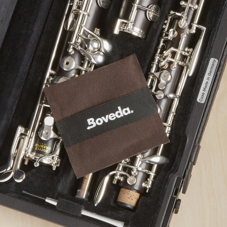 Boveda fabric holder placed in a large woodwind instrument case