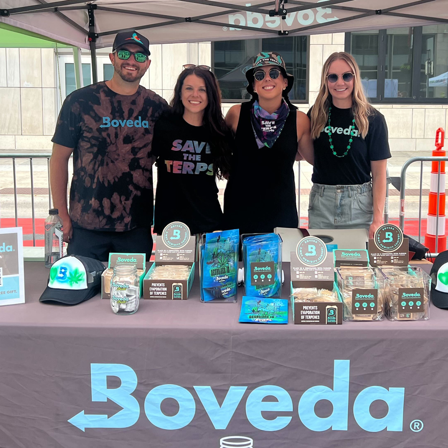 Boveda employees at a trade event.