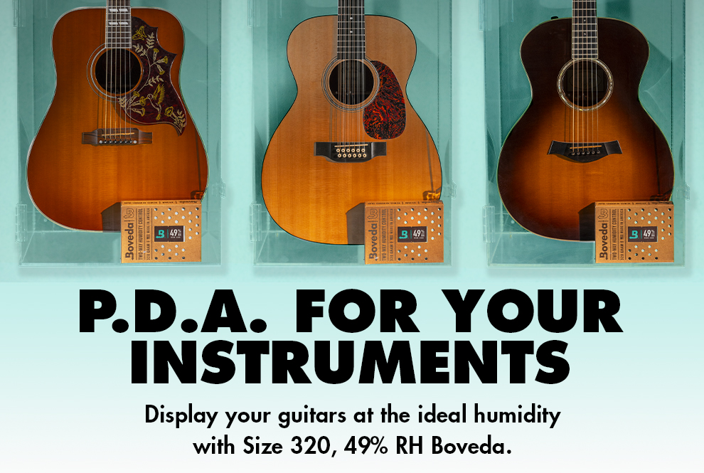 3 Guitars in dsiplay cases with 49% RH Size 320 inside.