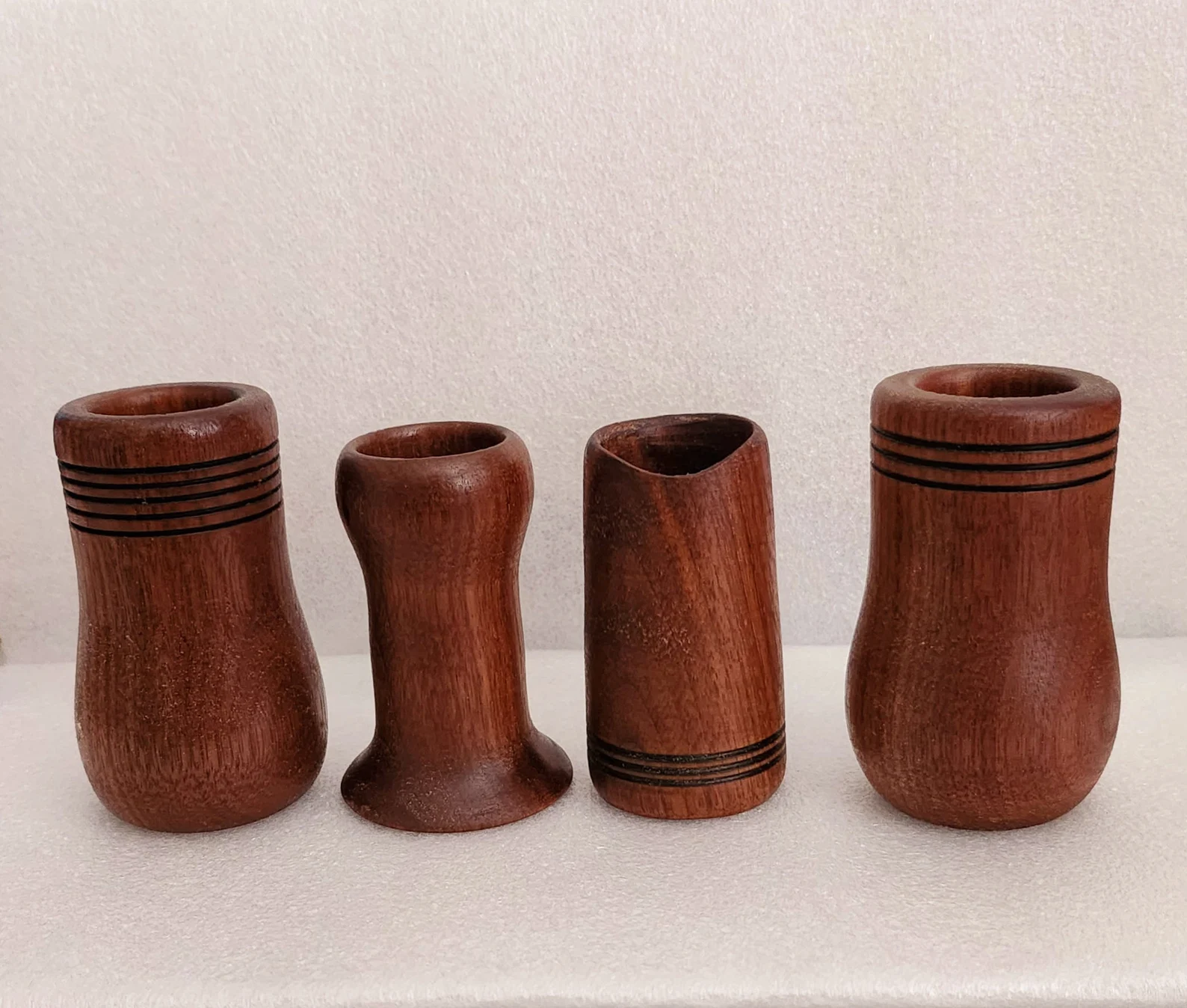 4 hand-turned walnut cigar snuffers used to put out a cigar