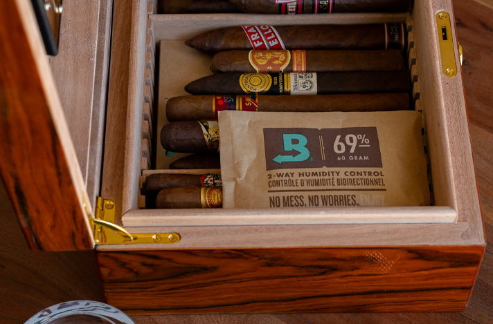 B69 Size 60 in a humidor with cigars