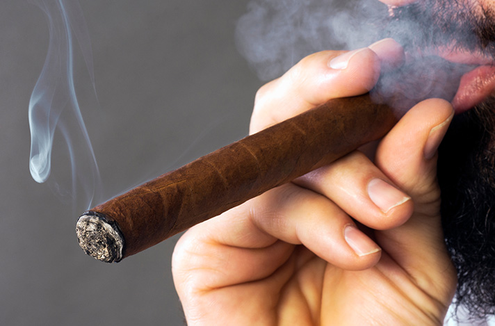 Smoking a cigar